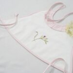 Bell Chime Aprons In Flannel With Frills