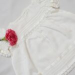 "Frocks In White Self Woven fabric Pintucks,Delicate Laces &ribbons"